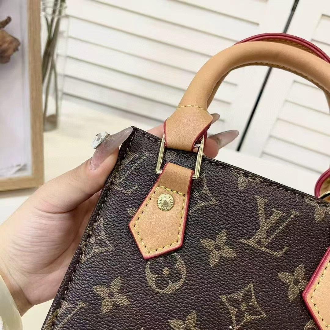 Handbag tal-Ġilda Luxe Tessut 009